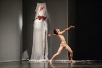 Marie-Agnés Gillot and Stéphane Bullion in a scene from the Paris Opera Ballet production of Pina Bausch’s Orpheus and Eurydice. Photo: Stephanie Berger.