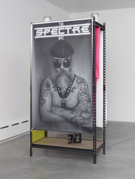 Nayland Blake, “Eleventh,” 2013. Particle board, fabric, metal, vinyl, paper, Plexiglas, glass, Crisco and inkjet on vinyl. 77 x 36 1/2 x 18 1/2”. (c) Nayland Blake, Courtesy Matthew Marks Gallery.