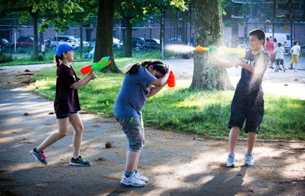<p>Irina and Robin hold their own during a very serious water fight—girls against boys—the first one of the summer.</p>
