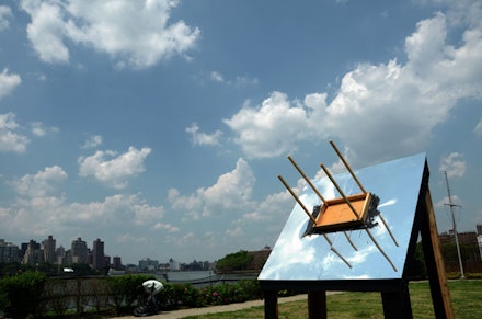 Instruction by Darren Bader, “Glue a [rectangular] table to the sky [table top up, somewhere not too close to the sky’s zenith]” 2012. Interpreted by Grayson Revoir. 12 x 8 x 8’, Wood, plexi mirror, tar. Photo: Nate Dorr.