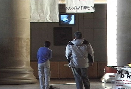 “Lobby 7” 1999. Performance and Documentation Video, 7min. Courtesy Jill Magid and Galerie Yvon Lambert, Paris.
