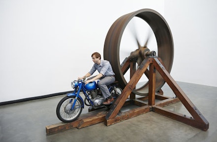“The Big Wheel” 1979. Three-ton, eight-foot diameter, cast-iron flywheel powered by a 1968 Benelli 250cc motorcycle. 112 × 175 × 143 in. Courtesy New Museum, New York. Photo: Benoit Pailley.
