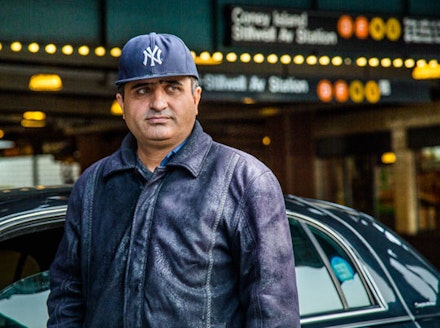 Abbullah, along with many other “freelance” cab drivers, waits under the Coney Island hub.