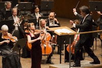 Lisa Batiashvili (violin) in a performance with the New York Philharmonic, Alan Gilbert conducting. Photo by Chris Lee.