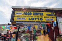  Lotto seller in Bed-Stuy, photograph by Matthew Vaz, 2005.