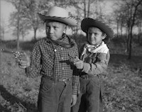 Robert “Corky” and Linda Poolaw (Kiowa/Delaware), dressed up and posed for the photo by their father, Horace. Anadarko, Oklahoma, ca. 1947. © 2014 Estate of Horace Poolaw. Reprinted with permission.