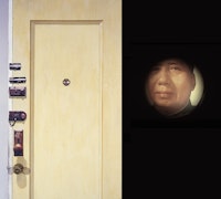 Zhang Hongtu, Front Door, 1995, Mixed media Installation with audiotape, 84˝ × 32˝.