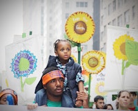 Father and Child at the historic People’s Climate March; September 21, 2014. Photo: Rae Breaux.