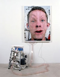 Tim Hawkinson, “Emoter” (2002), altered ink-jet print, monitor, stepladder, and mechanical components. Andrea Nasher Collection. Photograph courtesy Ace Gallery.