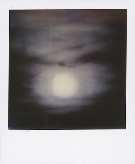 Kevin Zucker, <em>Untitled (Black & White Sunset)</em>, 2014. Polaroid. 3 1/2 × 4 1/4 inches. Courtesy the artist, Eleven Rivington, New York and Linn Luehn, Dusseldorf.