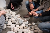 Installation view: Yoko Ono, <em>Stone Piece</em>, 2015/2016. Local riverbed rocks. Dimensions variable. Courtesy Andrea Rosen Gallery, New York. (C) Yoko Ono. Photo: Pierre Le Hors
