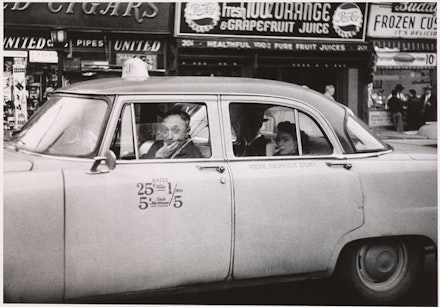Diane Arbus, <em>Taxicab driver at the wheel with two passengers, N.Y.C.</em>, 1956. © The Estate of Diane Arbus, LLC. All Rights Reserved. Courtesy The
Metropolitan Museum of Art.