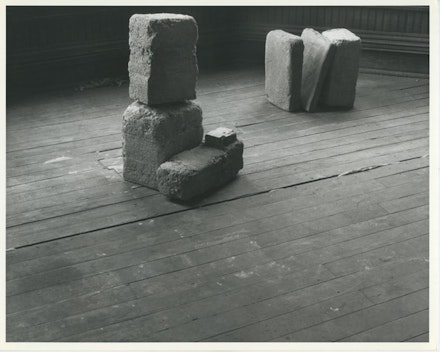 Beverly Buchanan  (American, 1940-2015).<em> Untitled (Slab Works 1)</em>, circa 1978 – 80.  Black-and-white photograph of cast concrete sculptures with acrylic  paint in artist  studio, 8 1/2  × 11 inches. Private collection. © Estate of Beverly Buchanan, courtesy  of Jane Bridges.