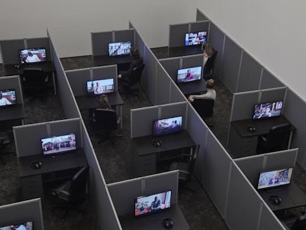 Kader Attia, <em>Reason’s Oxymorons</em>, 2015. 18 films and installation of cubicles. Films 13 to 25 minutes. 55 × 262 × 468 inches (installed overall). Courtesy the Artist and Lehmann Maupin, New York and Hong Kong.