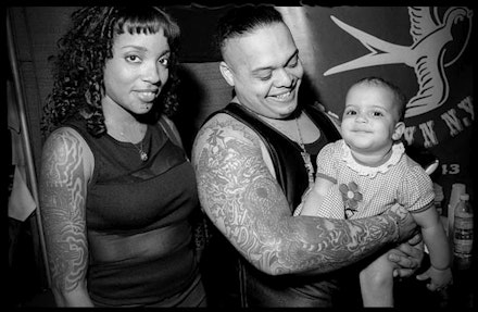 Maury Englander, <em>Tattooed family at the first New York City Tattoo Convention</em>, 1998. Digital print. © Maury Englander.

