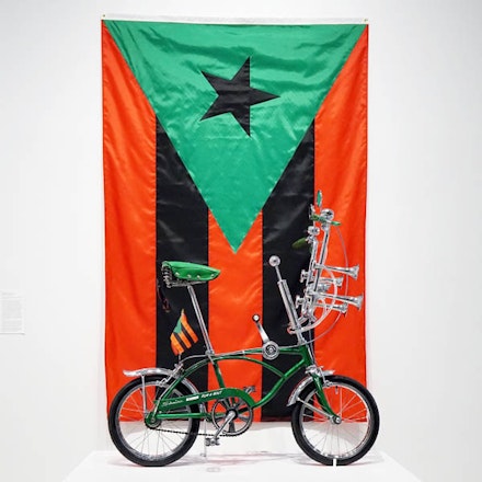 Miguel Luciano, <em>Run-a-Bout</em>, 2017, Puerto Rican Flag in Red, Black and Green, 2017 (photo: Chaz Langley)
