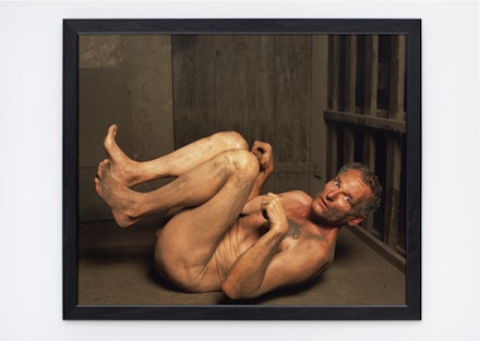 Andres Serrano, <em>Dog Position II (Torture)</em>, 2015. Pigment print, back-mounted on dibond, wooden frame, 60 x 50 inches.