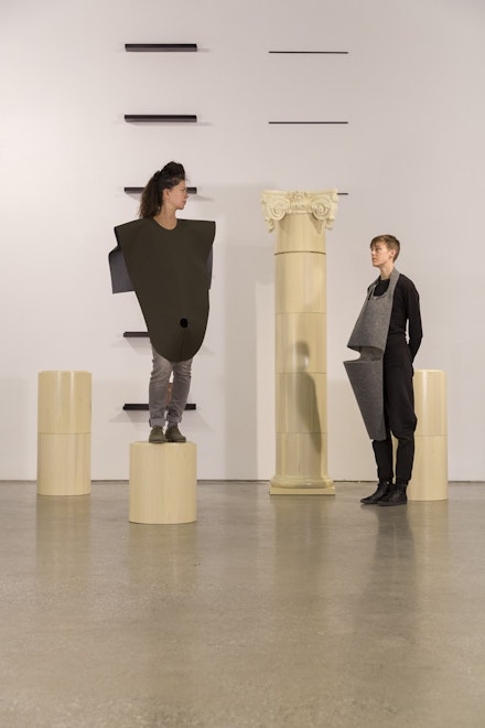 Caroline Woolard, <i>DIY Ruin</i>, installation view with costuming by Lika Volkova, at 41 Cooper Gallery, New York, 2016-2018, turned poplar, oil paint pickling, felt, website, 18