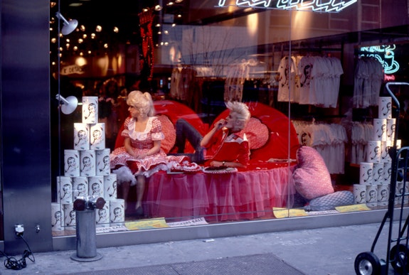 Valentine’s Day Repose, 1982. Photograph by April Palmieri. Pictured: Katy K and John Sex in the window of Fiorucci. Courtesy the artist.