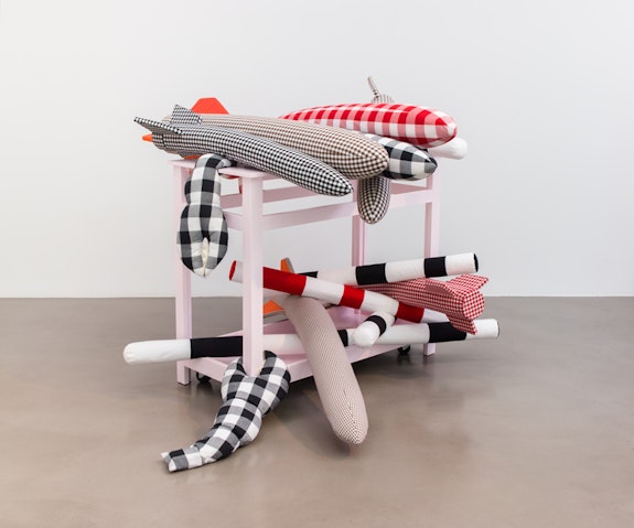 Cosima von Bonin, <em>AU PAIRS</em>, 2018. Cotton and wool covering cardboard, wooden table, 55 x 72 x 84 inches. Courtesy the artist and Petzel, New York.