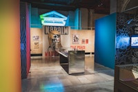 Installation shot of <em>You Say You Want A Revolution: Remembering the 60s</em>. Courtesy the NYPL. 