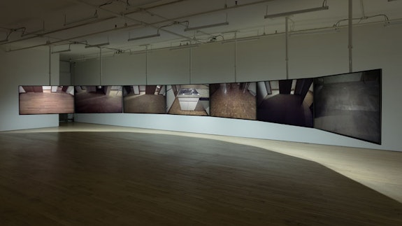 Glen Fogel, <em>With You... Me</em>, 2014–2018. 7-channel synchronized video, LED lighting, solid state relay, custom benches, sound, 12 minutes, 40 seconds. Image courtesy of the artist and JTT, New York. Photo: Charles Benton.