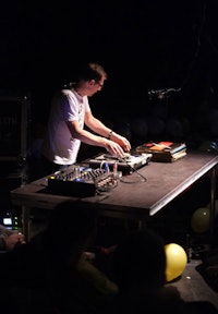 The artist performing<em> 33⅓ RPM </em>at Kabinet Múz, Brno, Czech Republic 2017. Image courtesy the artist.