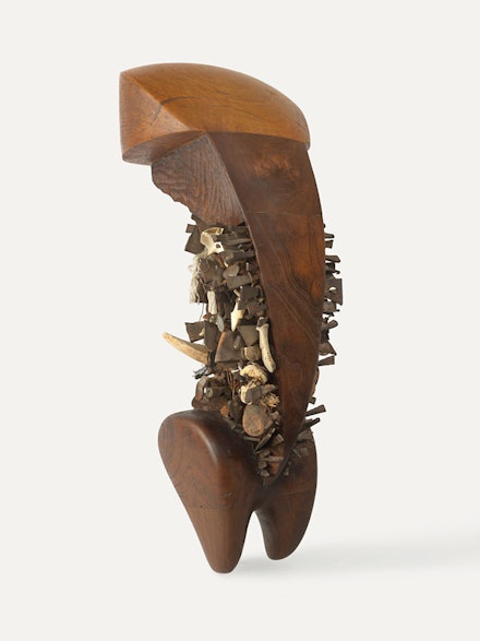 Jack Whitten, <em>Bosom, For Aunt Surlina</em>, 1985. Black Mulberry, cherry wood, metal, mixed media, 24 x 9 x 10 inches. Collection of the artist. © The Estate of Jack Whitten. Courtesy The Estate of Jack Whitten and Hauser & Wirth.
