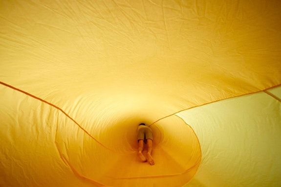 Tamar Ettun, <em>Yellow Inflatable</em>, 2016. Parachute fabric, thread, velcro, inflator, dimensions variable. Courtesy the artist. Photo: Josh Hawkins/UNLV Creative Services.