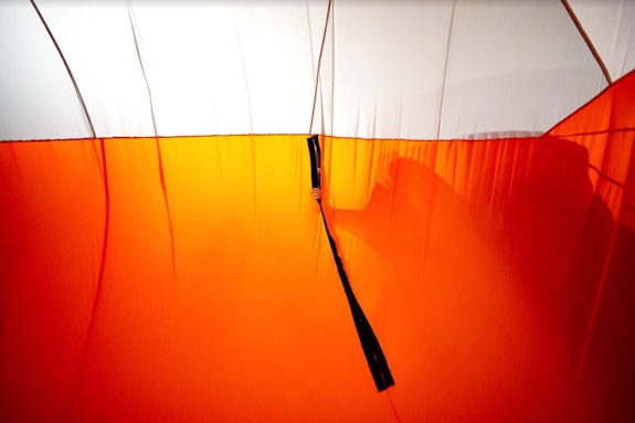 Tamar Ettun, <em>Orange Inflatable</em>, 2018. Parachute fabric, thread, velcro, inflator, dimensions variable. Courtesy the artist. Photo: Josh Hawkins/UNLV Creative Services.