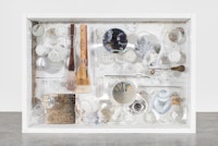 Mary Bauermeister (b.1934),<em> Brian O'Doherty Commentary Box</em>, 2017, ink, stone, offset print, glass, glass lens, paint brush, metal and wood tools and painted wood construction, 17