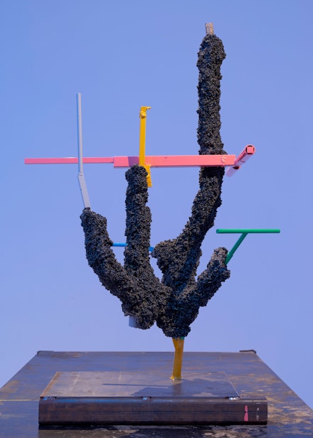 Nick van Woert, <em>Untitled</em>, 2019. Coal slag, steel, oil paint, white bronze on steel table, 61 x 47 x 29 inches. Courtesy the artist and GRIMM Amsterdam | New York. 