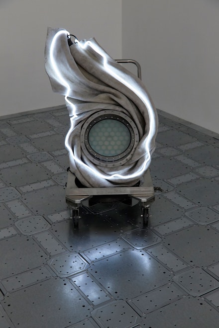 Elaine Cameron-Weir, <em>at the end of the line an echo sliding downtown the mercurial reflective pool of a familiar voice and me a person it never made real in the mirrors of my own halls</em>, 2019. Concrete, liquid candles, glass, stainless steel, leather, neon, 44 3/4 x 29 1/2 x 31 inches. Courtesy the artist and JTT, New York. Photo: Isabel Asha Penzlien.