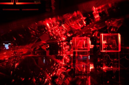 Constantina Zavitsanos, <em>Boxed Bet</em>, 2019. Transmission holograms, acrylic mounts, 5mW red laser. Courtesy Participant Inc. Photo: Mark Waldhauser.