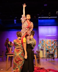 Laura K Nicoll (center), supported by Cooper Howell (left) and Lynn R. Guerra (right) in <em>BrandoCapote</em>. Rafael Jordan in background. Photo: Miguel Aviles.