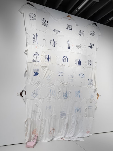 Richard Hughes, <em>Man Is Lost</em>, 2019. Printed t-shirts, coat hangers, polyester, resin, fiberglass, 156 x 106 inches. Courtesy the artist and Anton Kern, New York.