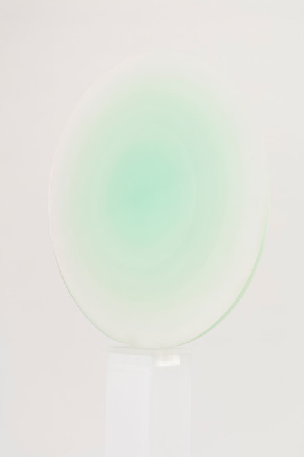 Helen Pashgian, <em>Untitled</em>, 2019. Cast epoxy with artist made pedestal, 26 inches (diameter, 51 1/2 x 5 1/8 inches, (pedestal). Courtesy the artist and Lehmann Maupin, New York, Hong Kong, and Seoul. Photo: Joshua White.