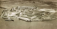 Aerial view of unfinished Rikers Island penitentiary buildings, c.1930s. Courtesy NYC Municipal Archives.