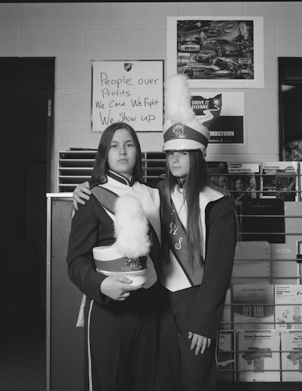 LaToya Ruby Frazier, <em>Cindy Higinbotham and Monet Hostutler, best friends and banner carriers, in the Lordstown High School band room, Lordstown, OH</em>, from <em>The Last Cruze</em>, 2019. Courtesy the artist and Gavin Brown’s Enterprise, New York / Rome.