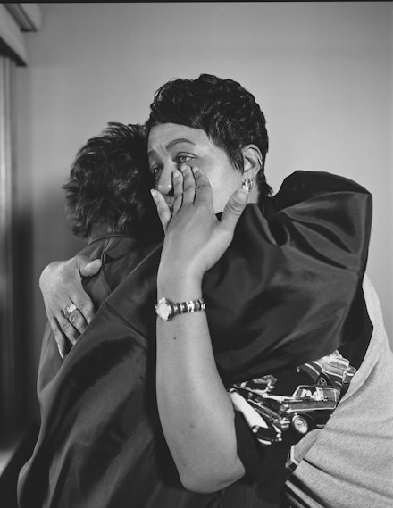 LaToya Ruby Frazier, <em>Kesha Scales hugging Beverly Williams in her living room (22 years in at GM Lordstown Assembly, pressroom), Youngstown, OH, from  <em>The Last Cruze</em>, 2019. Courtesy the artist and Gavin Brown's Enterprise, New York / Rome.
