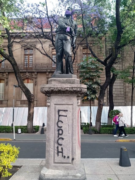 Several monuments and statues were adorned with purple and green bandanas. Photo: David Schmidt.