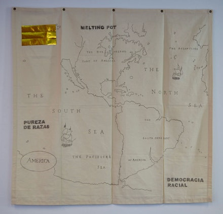 Jaime Lauriano, <em>America</em>, 2020. Drawing made with black pemba (chalk used in rituals of Umbanda), dermatographic pencil, charcoal and golden self-adhesive high tack tape on cotton. 150 x 160 cm. Courtesy the artist. Photo: Alex Korolkovas/Courtesy of AnnexB.