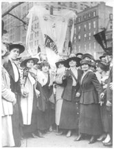 <i>Garment workers parading on May Day, New York City, 1916.
Photo from George Grantham Bain Collection (Library of Congress).</i>