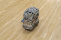 Rafael Domenech, <em>Bad infinities: laboratory of fragments, Heteroglossic city,</em> 2019-20. Unique object, found concrete rock, laser-print on paper, tape, book-cloth.