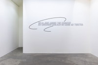 Lawrence Weiner, <em>HELD JUST ABOVE THE CURRENT</em>, 2016. Language + the materials referred to, dimensions variable. Courtesy the artist and Kerlin Gallery, Dublin.