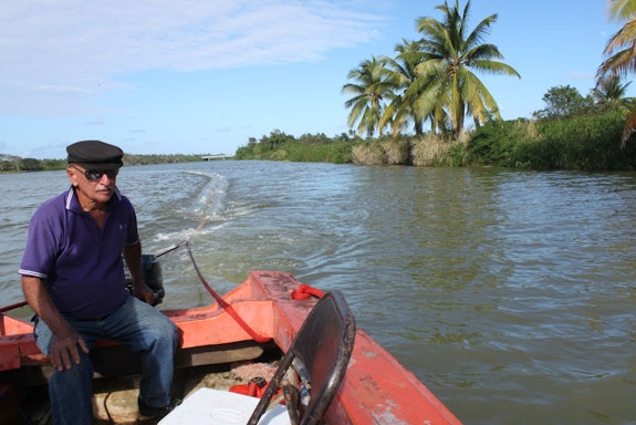 Don Mario Betancourt, Founder of the Canóvanas Fishermen’s Association, knowledgeable about the Rio Grande de Loíza and handler and owner of the boat. Photo: Prof. Vanessa Hernández Gracia. 