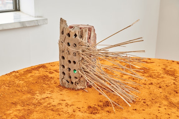 Sophie Friedman-Pappas, <em>City Full of Sticks</em>, 2020. Brick, found object, and plastic sequin, 8 x 3 1/2 x 12 inches. Photo: Timothy Mahoney.