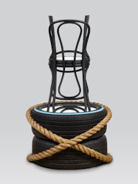 Dorthea Rockburne, <em>Reflections</em>, 2021. Bentwood chairs, tire, rope, mirrors, PVCflexible coupling with stainless steel clamps, and enamel paint. 56 in x 34in x 34in. Photo: Jason Manella. Courtesy the artist.