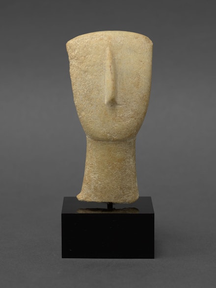 Cycladic Marble Head, Late Spedos Variety, Early Cycladic II, c. 2500–2400 BC. 3 1⁄2 inches high. Private collection. Courtesy Craig F. Starr Gallery, New York.