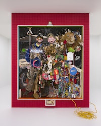 Mike Shultis, <em>Hunting Legends</em>, 2021. Oil, acrylic, Afghan war rug, wood, fabric, beads, shoes, pants, fake money, cologne bottle, flag pole, foam board, archival inkjet prints, screws, resin, button-up shirts, t-shirt, hats, wigs, zip ties, foam, taxidermy bat, taxidermy ducklings, taxidermy baby chick, fox hides, fox tails, stuffed animals, work gloves, neon sign, night lights, extension cord, plexiglass, fake cockroach, fake flies, toys, dog leashes, fake butterflies, glasses, cuckoo clock, flamingo lawn ornament, artist’s hair, glass sphere, fraternity paddles, vintage gun patches, wristbands, pins, vinyl, and string on panel, artist's frame, mounted on painted cracker wall, 117 x 96 x 20 inches. Courtesy the artist and ASHES/ASHES.